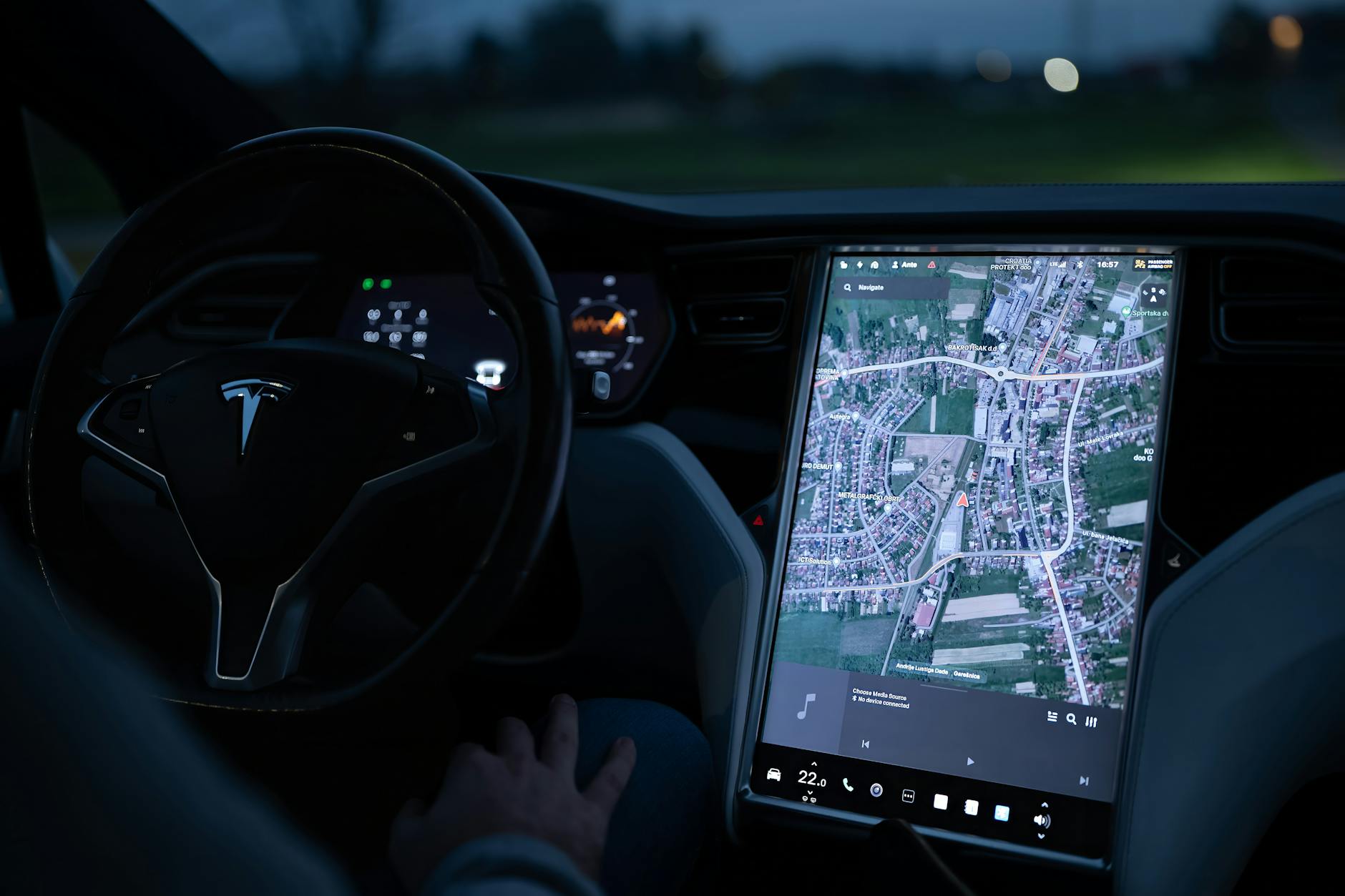 view of a tablet showing the map in a tesla