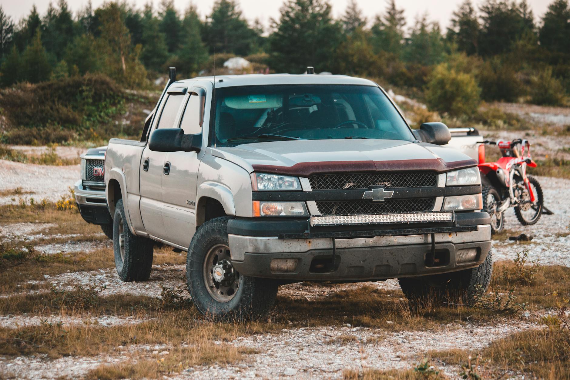 a chevrolet pickup truck on the grass field