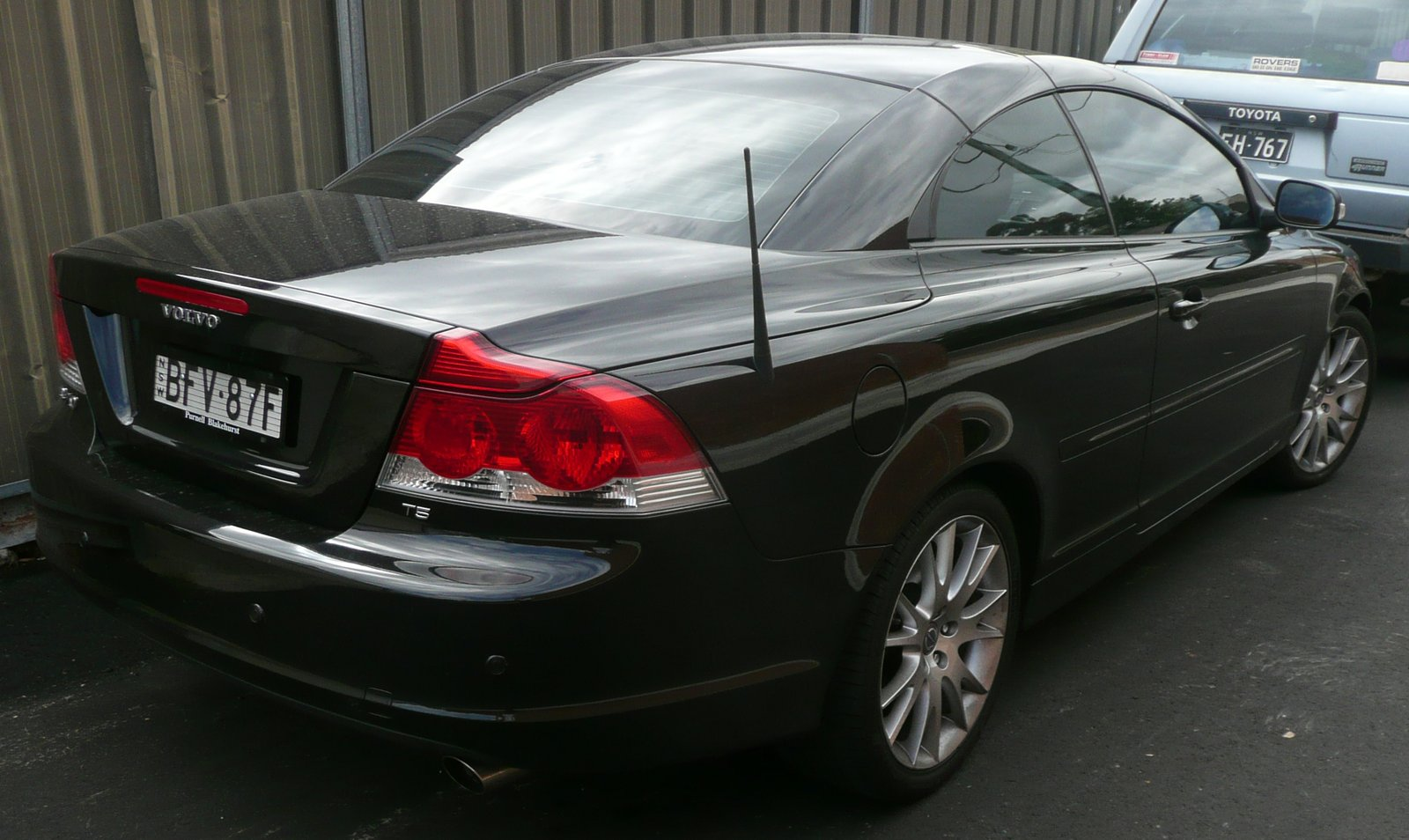 Black 2007-2008 Volvo C70 T5 with its retractable hardtop closed, rear three-quarter view