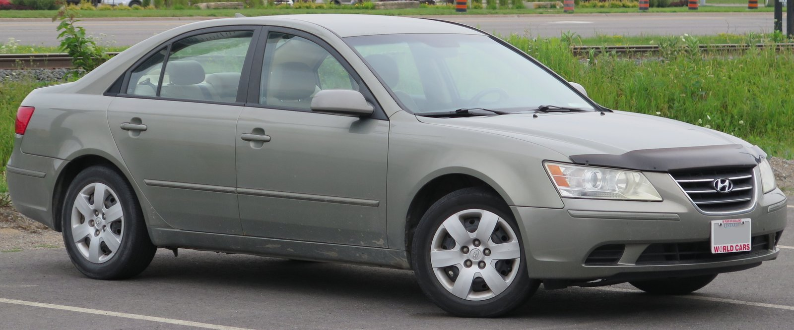 2009 Hyundai Sonata GLS sedan in Natural Khaki, NF generation, front right view